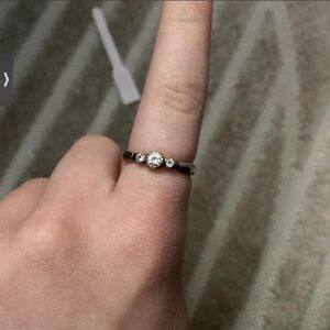 Delicate Three-Stone Gold Ring with Clear Stones